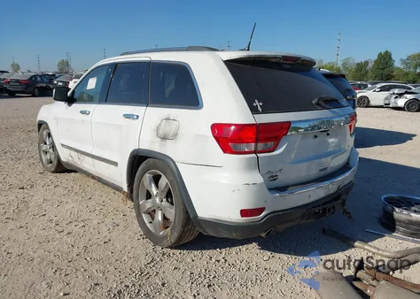 2013 Jeep Grand Cherokee Overland z USA, uszkodzony, nr VIN 1C4RJFCT7DC525316